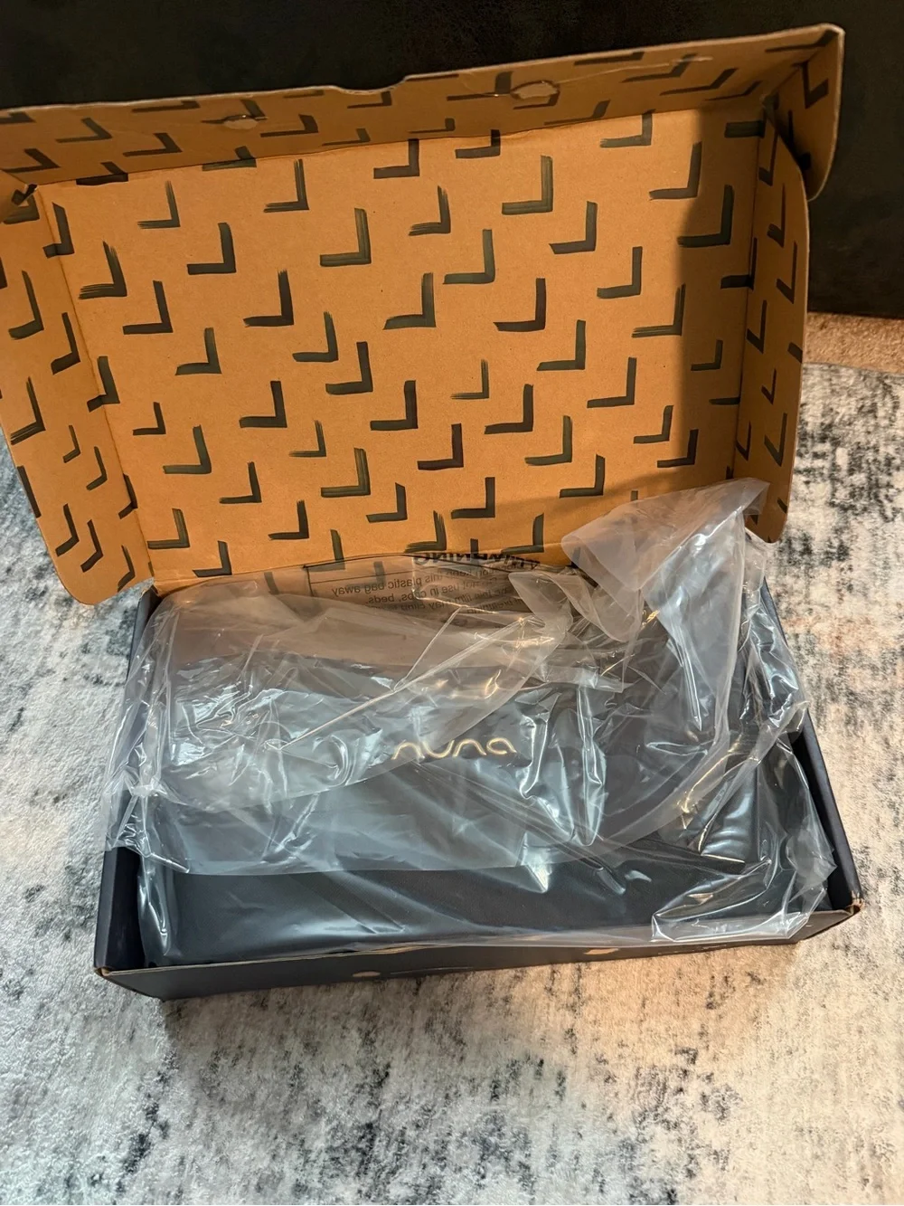 Black NUNA stroller organizer